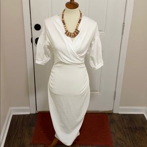 White knee length fitted dress with tie